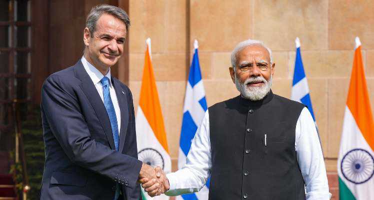 Prime Minister Narendra Modi shakes hands with Prime Minister of Greece Kyriakos Mitsotakis at the Hyderabad House, in New Delhi. 