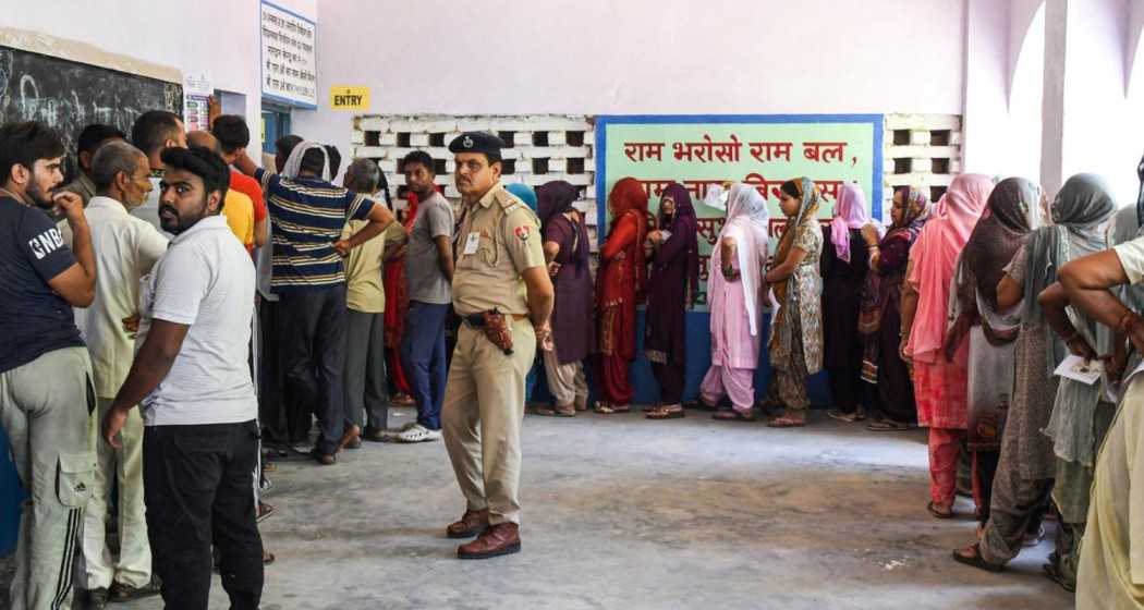 Haryana assembly elections: Voters in queues to cast their vote at a polling station in Panchkula on Saturday.