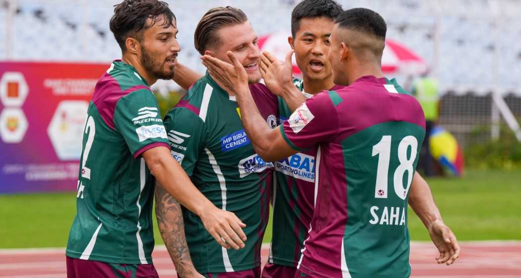 Jason Steven Cummings (35) of Mohun Bagan SG celebrates with teammates after scoring a goal during the 2024 Durand Cup football match between Mohun Bagan SG and Indian Air Force, at VYBK stadium in Kolkata, Thursday, Aug. 8, 2024