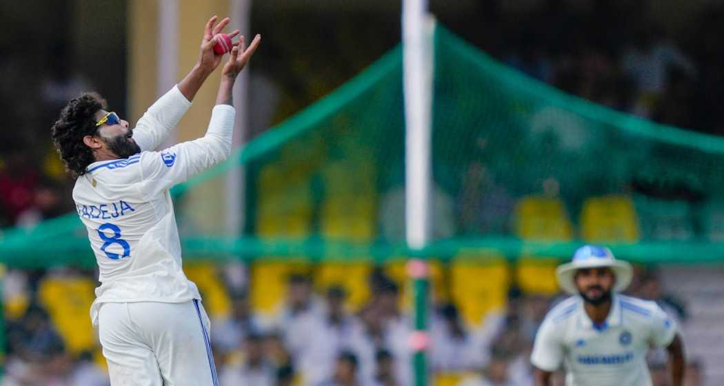 India's Ravindra Jadeja takes the catch of Bangladeshi batter Khaled Ahmed during the fourth day of the 2nd Test cricket match between India and Bangladesh, at the Green Park stadium, Kanpur, Monday, Sept. 30, 2024.