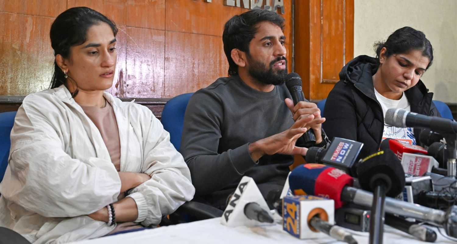 Vinesh Phogat, Bajrang Punia and Sakshi Malik briefing the press. Image X.