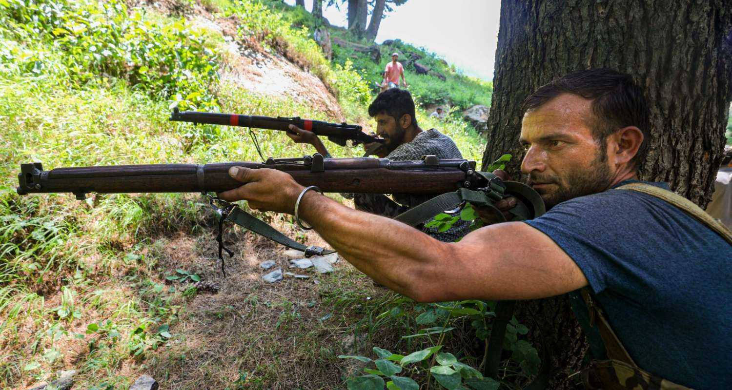 Village Defence Guards keep vigil at a forest area near the encounter site, in Desa area of Doda district, Jammu and Kashmir, Wednesday, July 17, 2024. 