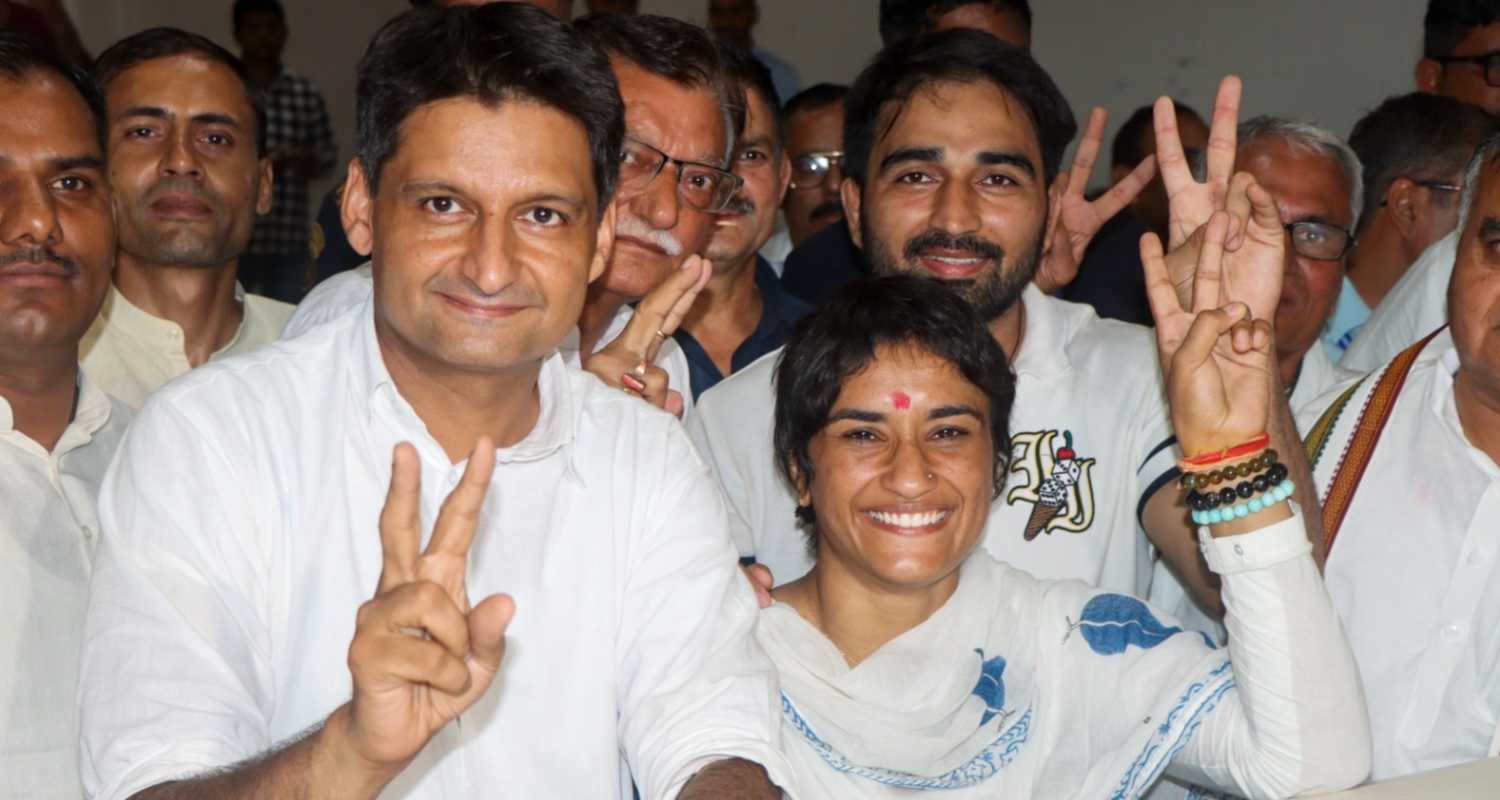 Congress leader Deepender Hooda, former wrestler and Congress candidate from Julana constituency Vinesh Phogat, her husband and wrestler Somvir Rathee and others during her nomination filing for the upcoming Haryana Assembly elections, in Jind district, Wednesday. 