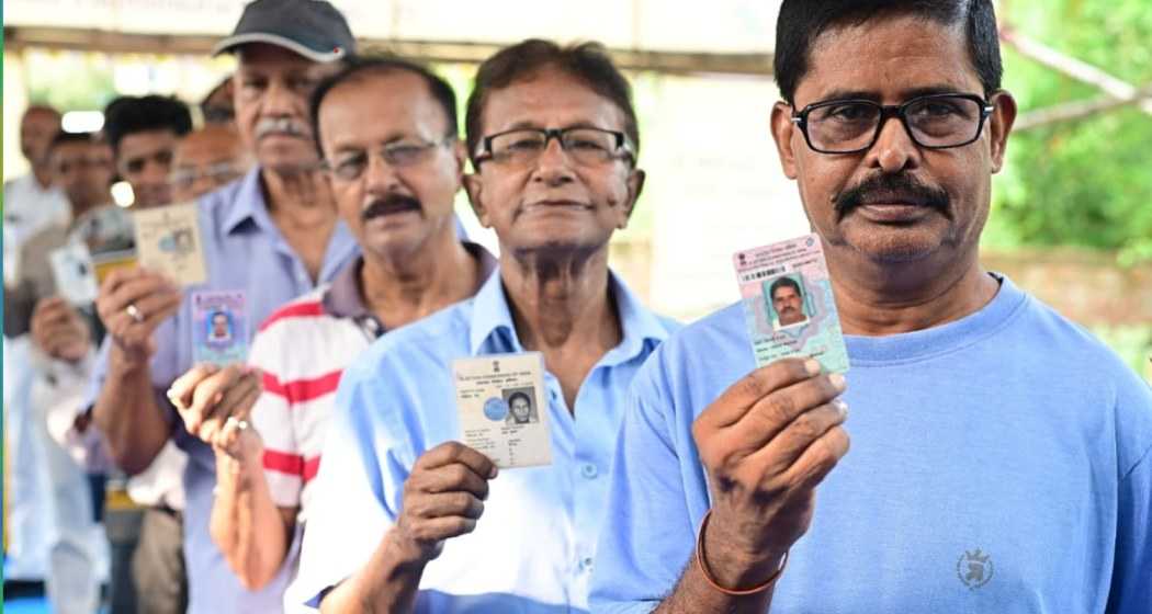 Voters queue up to cast their votes at a polling station in Jadavpur, Kolkata South district, West Bengal.