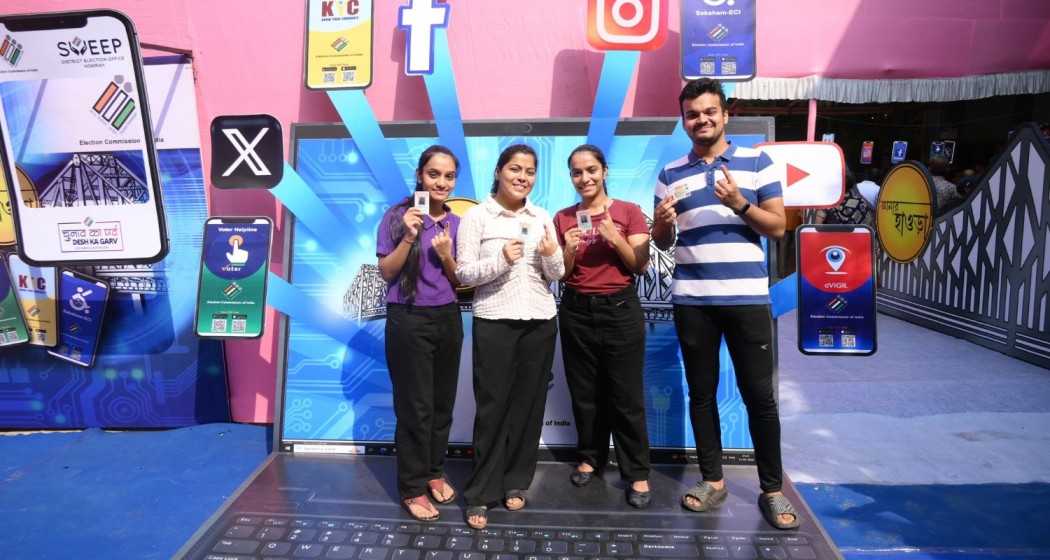 Voters enthusiastically take selfies with inked fingers after voting at a model polling station themed around ECI Tech Apps at Jogesh Chandra Girls' High School, Howrah, West Bengal on Monday.