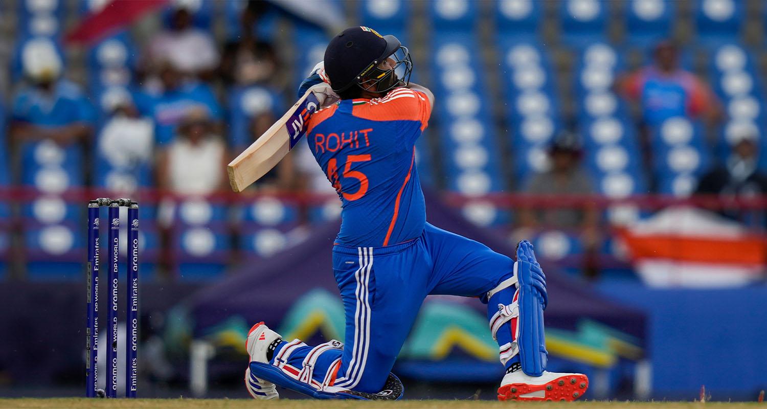 India's captain Rohit Sharma plays a shot for six runs against Australia during an ICC Men's T20 World Cup cricket match at Darren Sammy National Cricket Stadium in Gros Islet, Saint Lucia, Monday, June 24. 