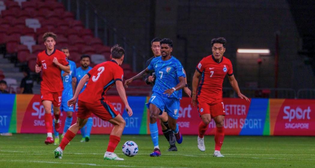 Indian and Singapore players in action during the AFC Asian Cup Qualifier match in Singapore, where India held the hosts to a 1-1 draw.