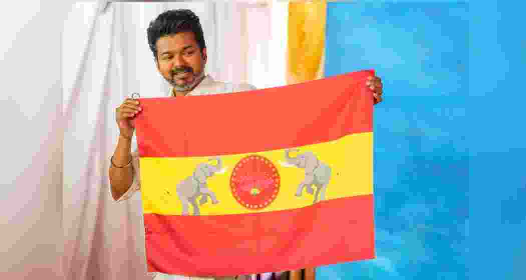 Actor-turned-politician and Tamilaga Vettri Kazhagam President Vijay unveils party's flag at party headquarters, on the outskirts of Chennai, Thursday, Aug. 22, 2024. 