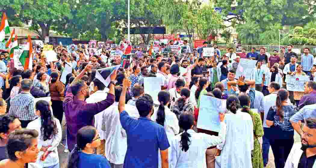 Students protest against the alleged rape and murder of a trainee doctor at Kolkata's RG Kar Medical College and Hospital.