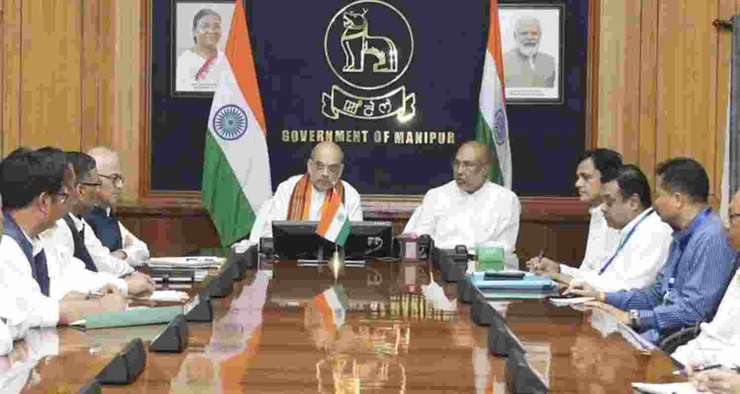 Amit Shah with Manipur Chief Minister N Biren Singh's council of ministers.