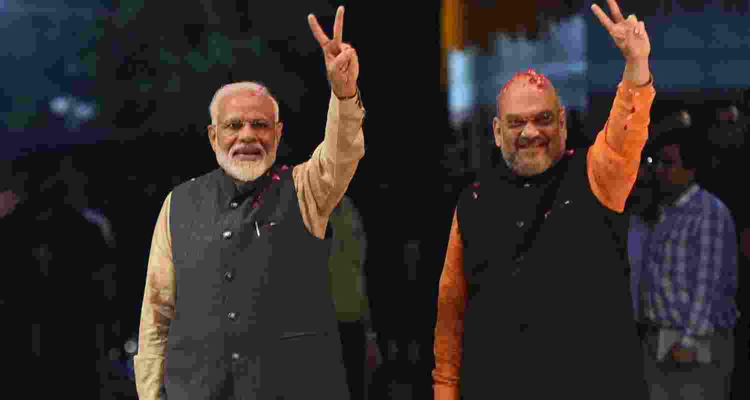 An image of Prime Minister Narendra Modi with Home minister Amit Shah.