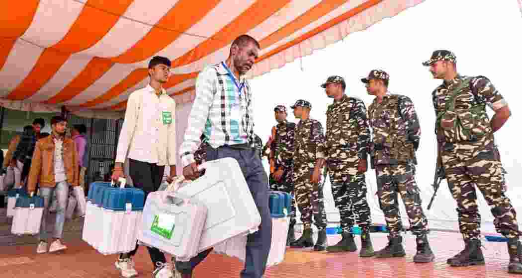 Polling officials with EVMs, other election material leave for poll duty. File Photo.