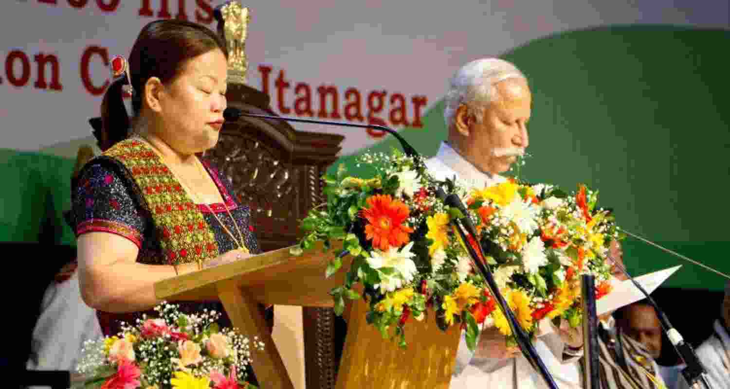 Dasanglu Pul taking oath as a minister in the Arunachal Pradesh government at the Dorjee Khandu Convention Hall in Itanagar on Thursday.