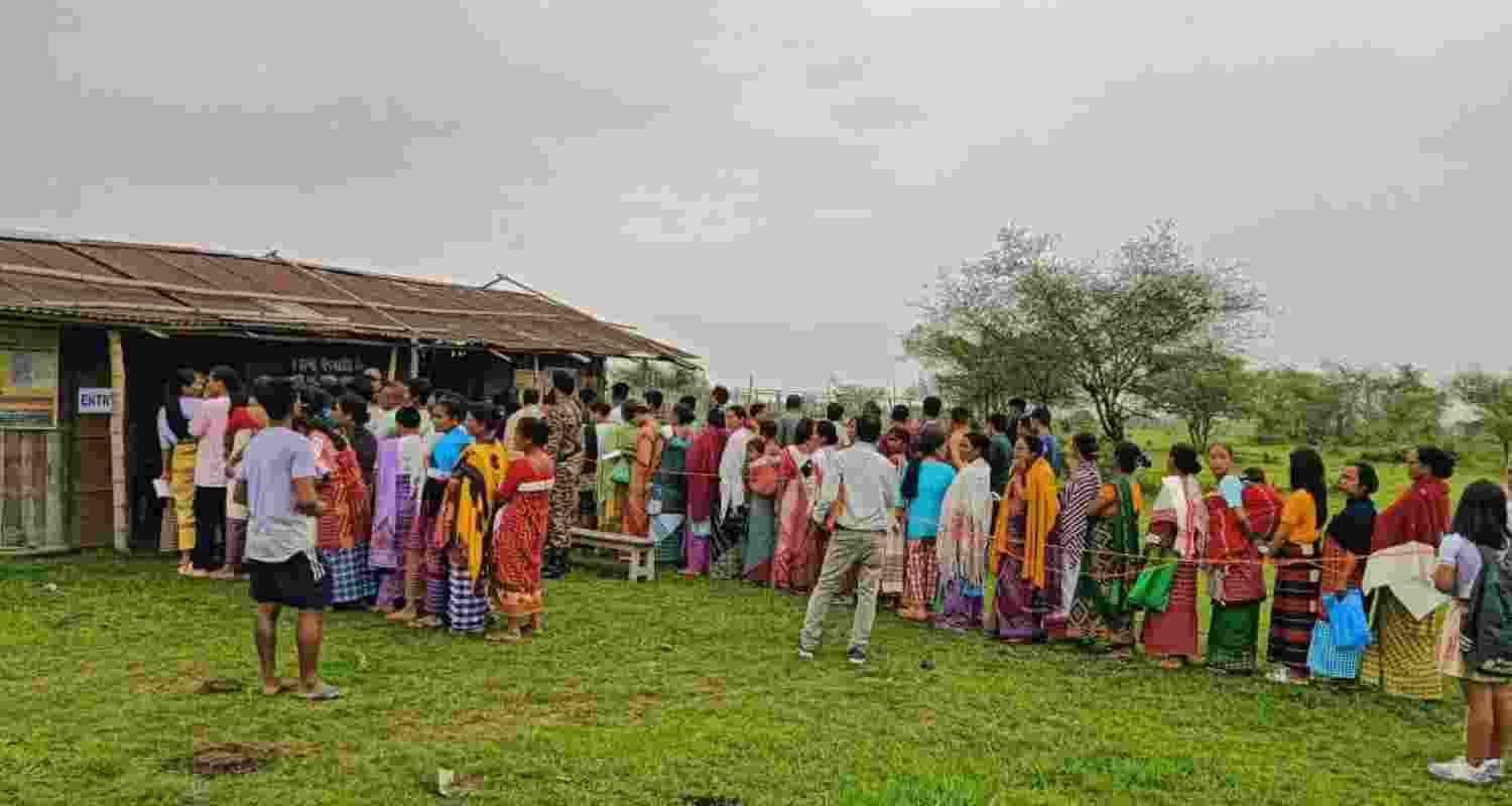 Long queues of voters, at polling stations in Assam casting their vote in the first phase of the General Elections 2024.