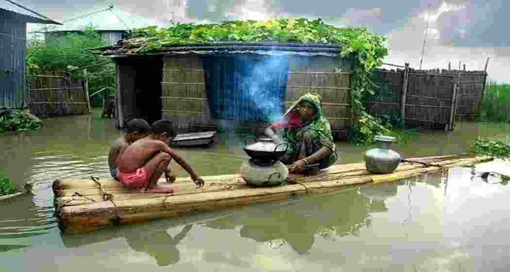 Flood waters wreak havoc in Assam, affecting over 1 lakh people.