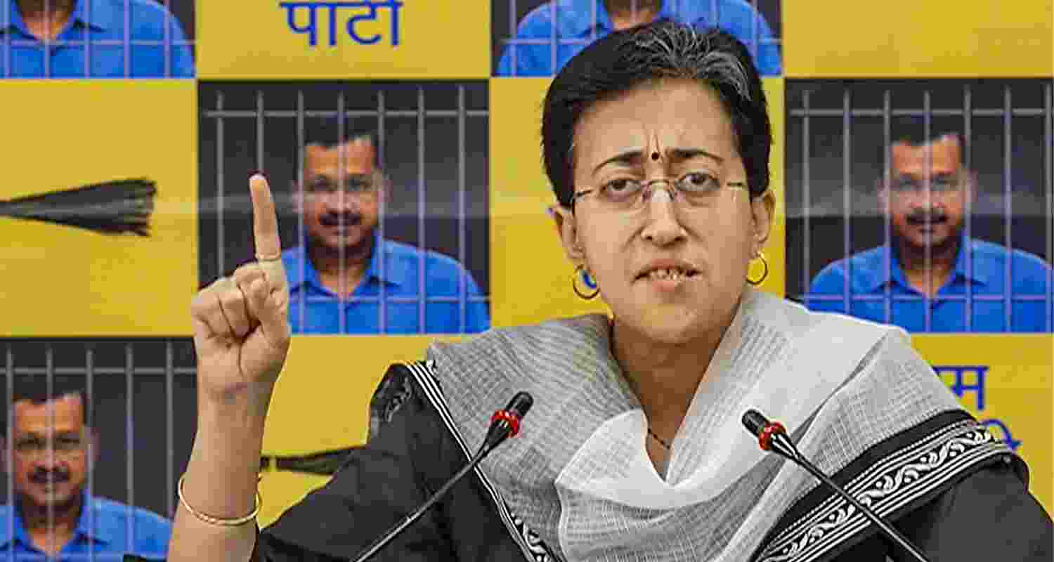 Atishi Singh addresses a press conference.