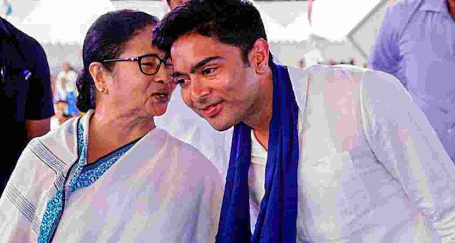 Mamata Banerjee with TMC leader Abhishek Banerjee. 
