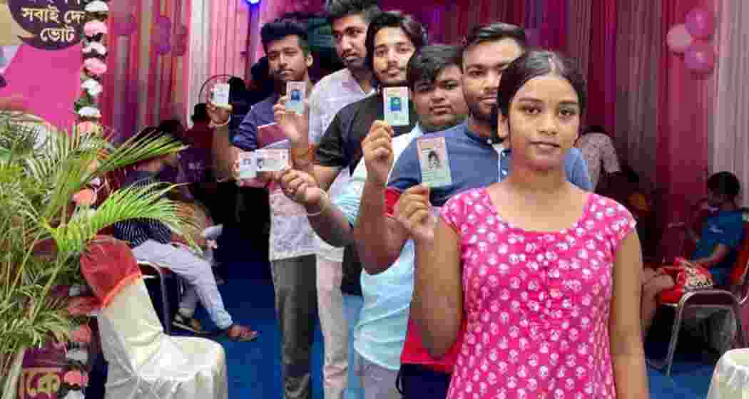 Queue of first-time electors waiting to cast their votes at the Model Polling Station (Haringhata Mahavidyalaya) in the Bongaon (SC) Parliamentary Constituency of West Bengal on Monday.