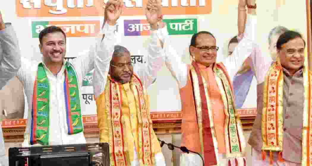 (From Left) Assam Chief Minister cum Jharkhand election co-incharge Himanta Biswa Sarma, Union Agriculture Minister cum Jharkhand election incharge Shivraj Singh Chouhan, Jharkhand BJP president Babulal Marandi, AJSU Party Chief Sudesh Mahto and MLA Ramchandra Sahis during a joint press conference in Ranchi on Friday.   