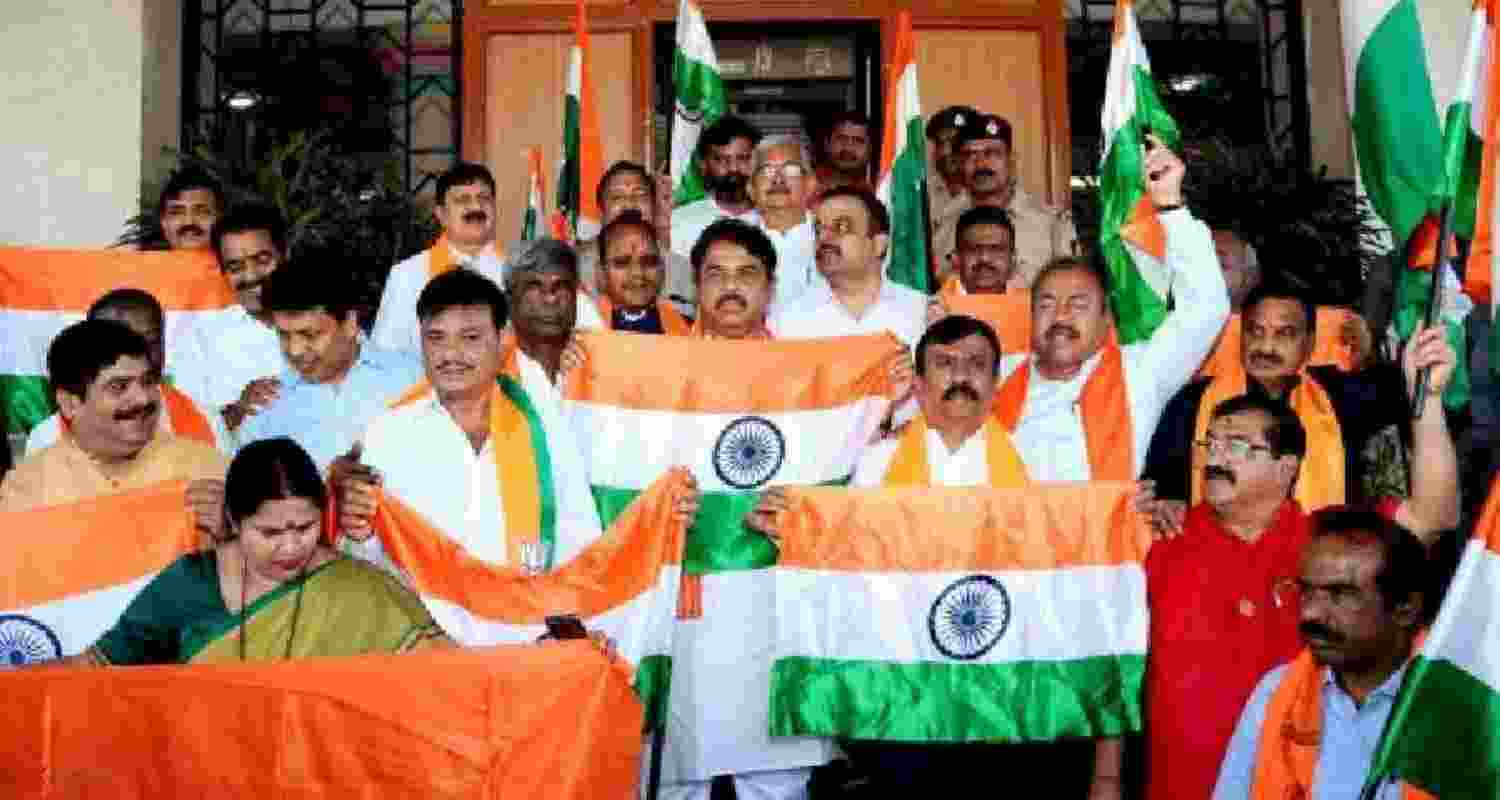 BJP MLAs hold a protest against alleged pro-Pakistan sloganeering at the Karnataka Assembly on Wednesday.