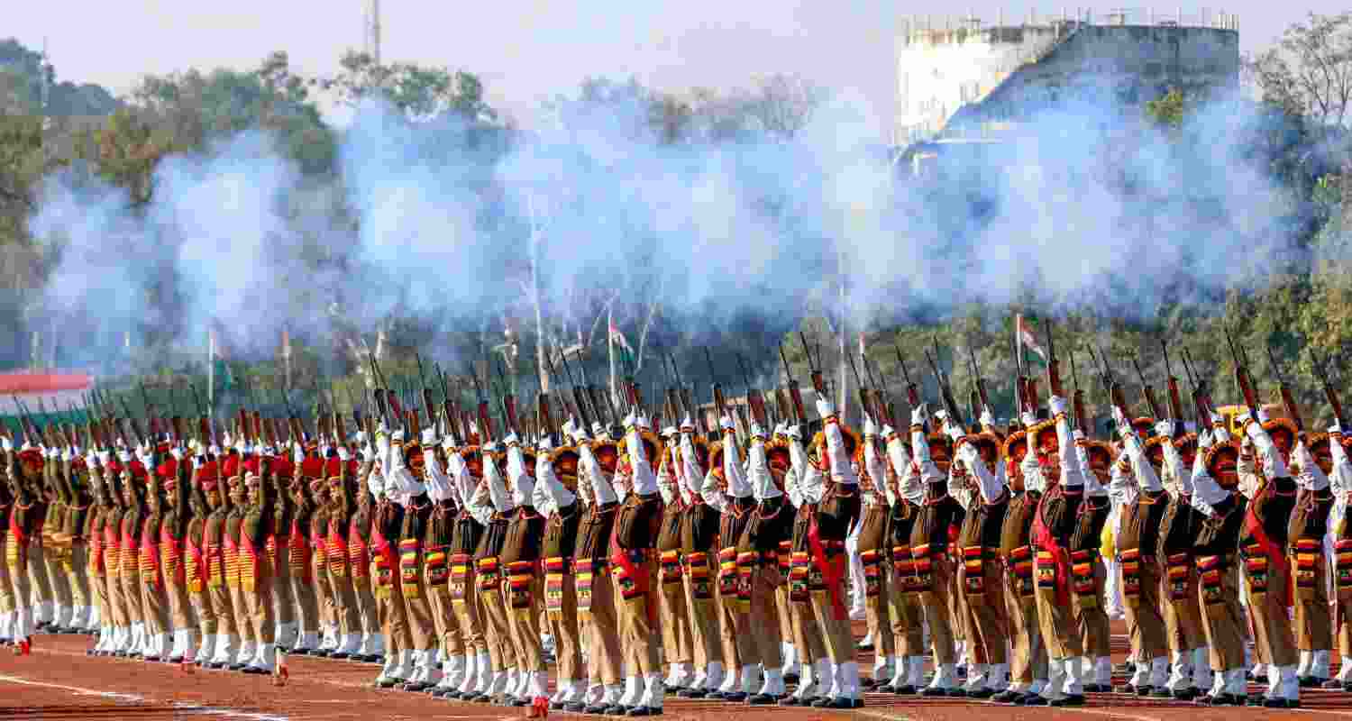 Sending Thunder to the Skies: An alluring sight as scores of Madhya Pradesh Police personnel launch a ceremonial gunfire during Republic Day celebrations at Lal Parade ground, in Bhopal. 