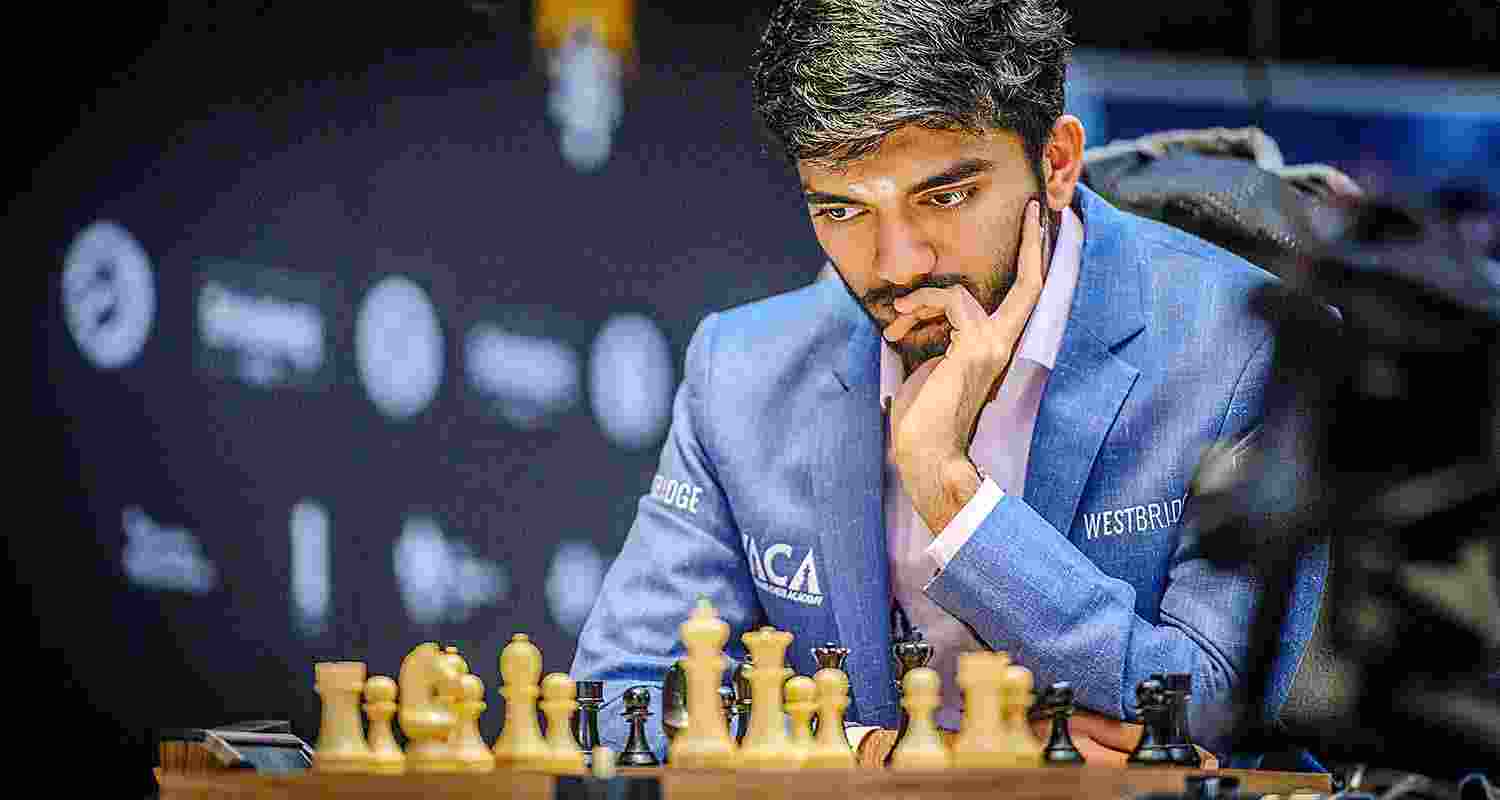 Indian Grandmaster D Gukesh held on to the joint top spot with Russian Ian Nepomniachtchi after they played out an easy draw in the 10th round of the Candidates chess tournament.