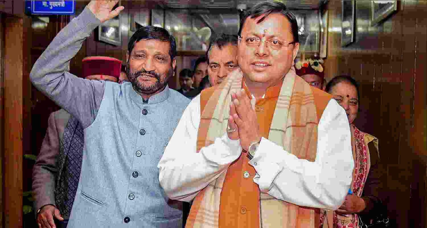 Uttarakhand CM Pushkar Singh Dhami with others after the UCC bill was tabled in the state assembly, in Dehradun. 