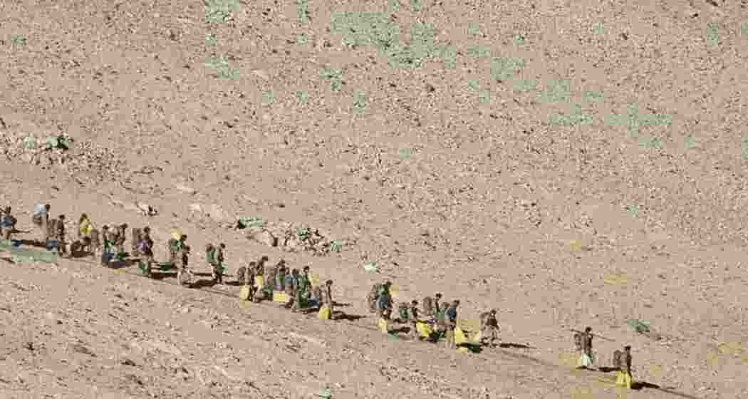 Indian and Chinese troops and tanks disengage from the banks of Pangong lake area in Eastern Ladakh where they had been deployed opposite each other for almost ten months in the year 2021.