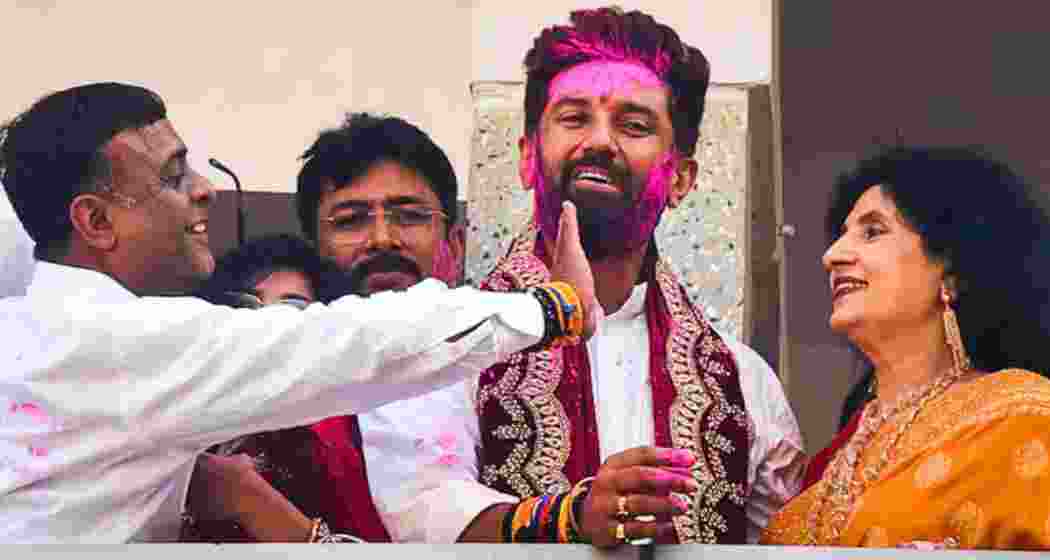 LJP (Ram Vilas) chief Chirag Paswan celebrates the Lok Sabha election results, in Patna on June 4, 2024. 