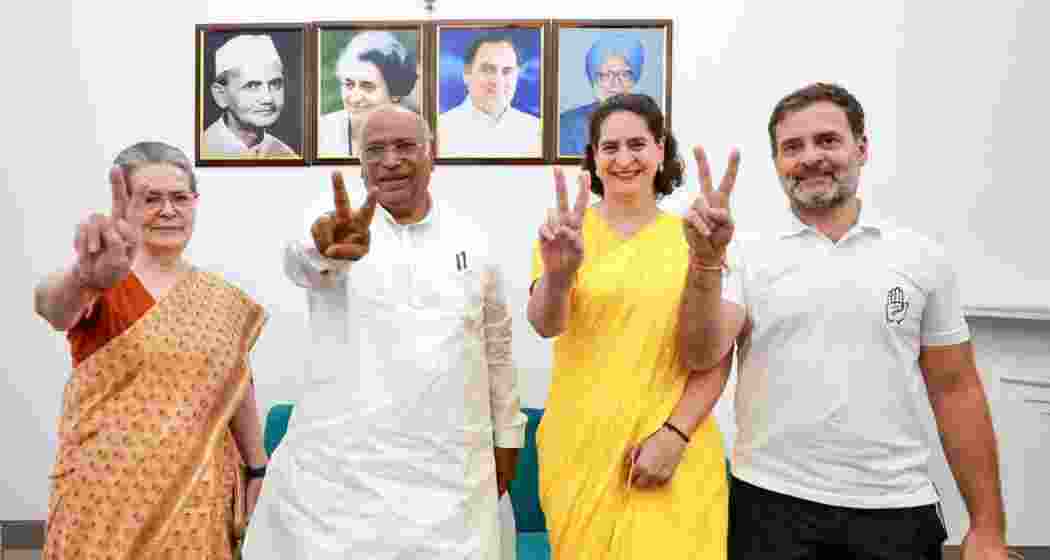 Congress Parliamentary Party (CPP) chairperson Sonia Gandhi, Congress president Mallikarjun Kharge, party general secretary Priyanka Gandhi Vadra and party leader Rahul Gandhi show victory signs while posing for a picture after the Lok Sabha election trends and results, in New Delhi on Tuesday. 