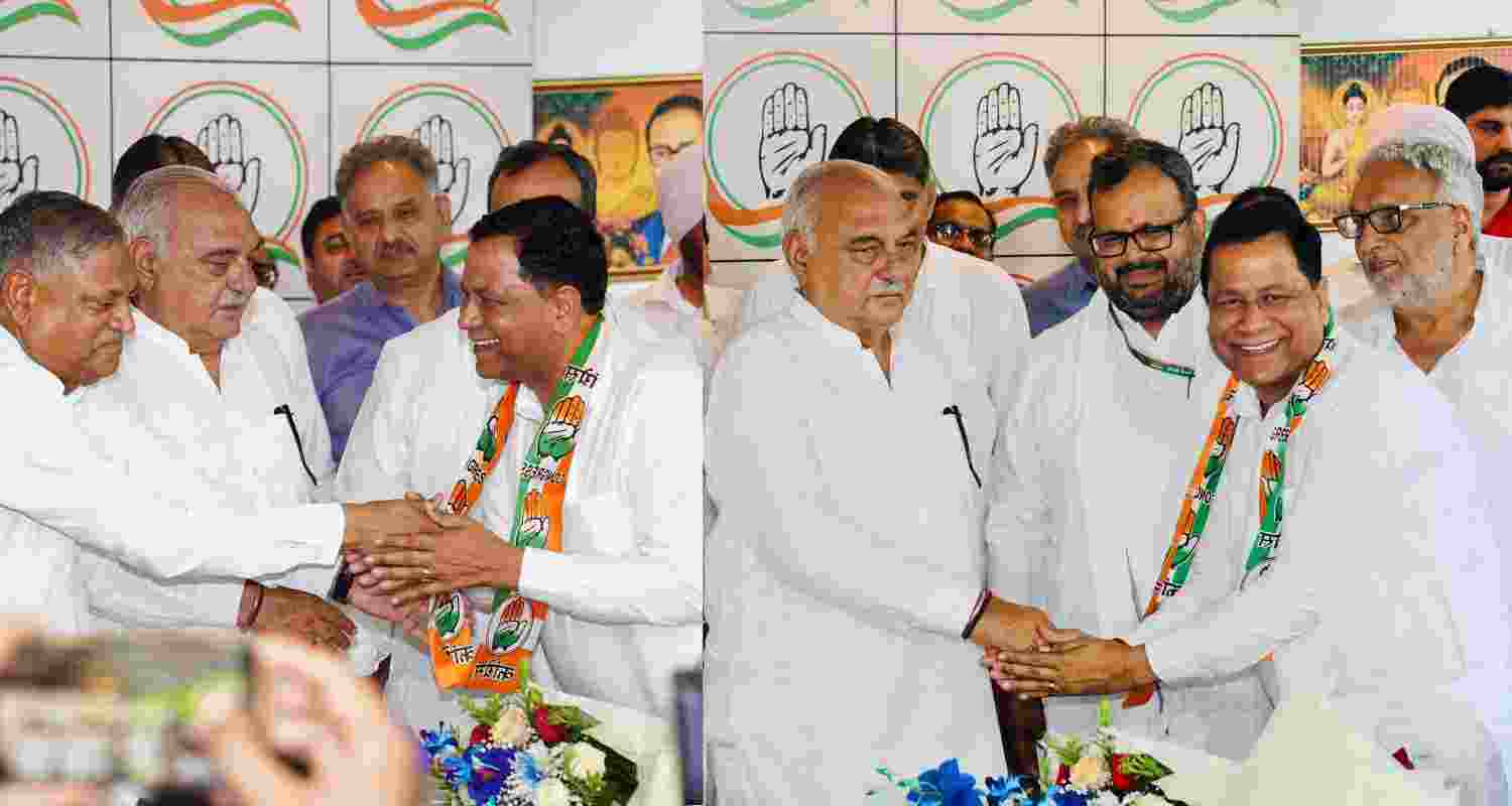 Adarsh Pal Singh with Bhupinder Hooda, as he switches to Congress. 