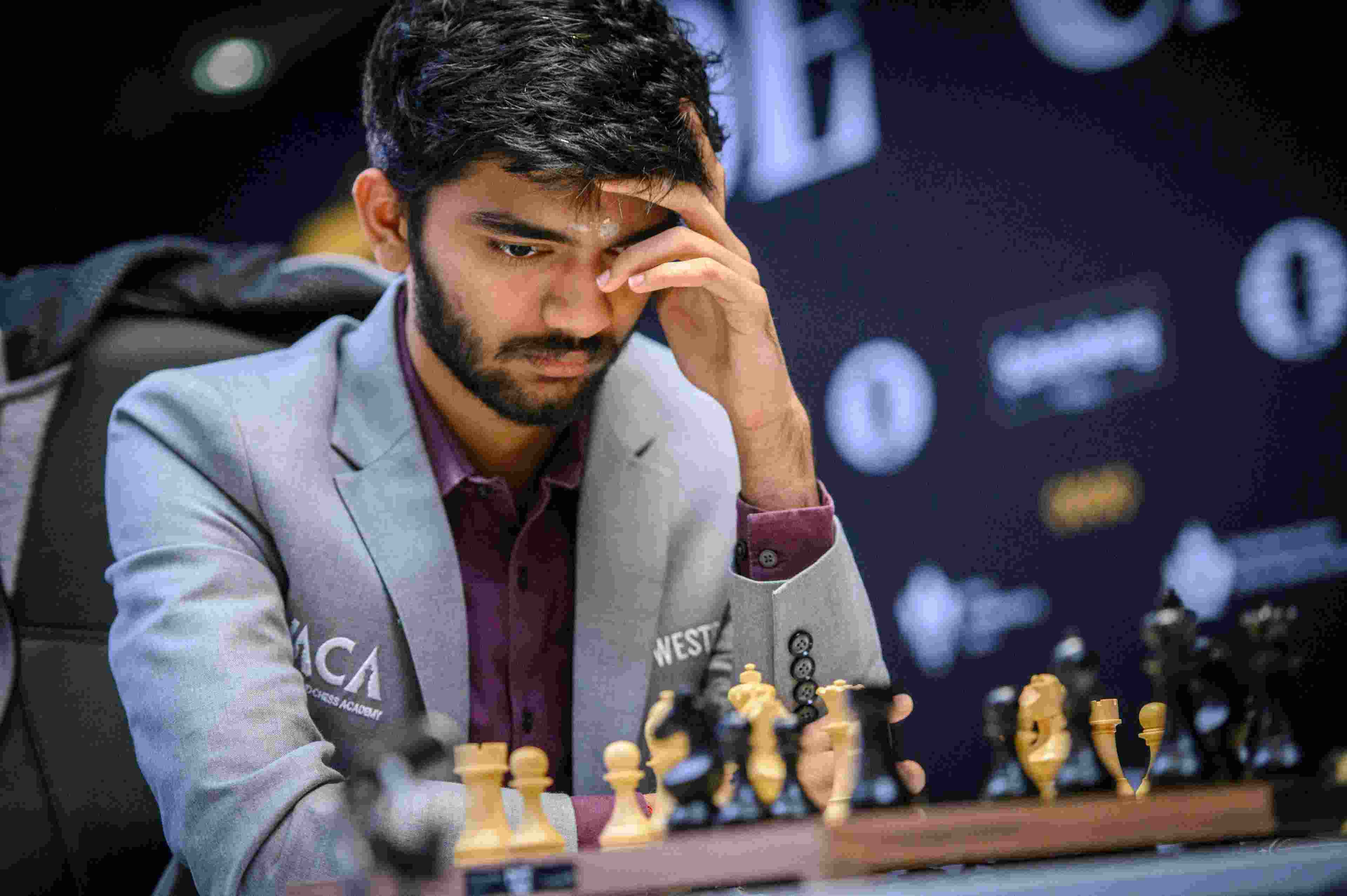 Grandmaster D Gukesh played out a creditable draw against top seed Fabiano Caruana but slipped a rung to the joint second position on a day when two other Indians endured frustrating losses in the Candidates Chess Tournament's 11th round