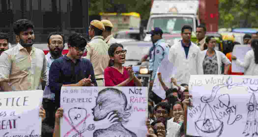 Doctors protest against the sexual assault and killing of a postgraduate trainee doctor in Kolkata, in New Delhi on Monday. 