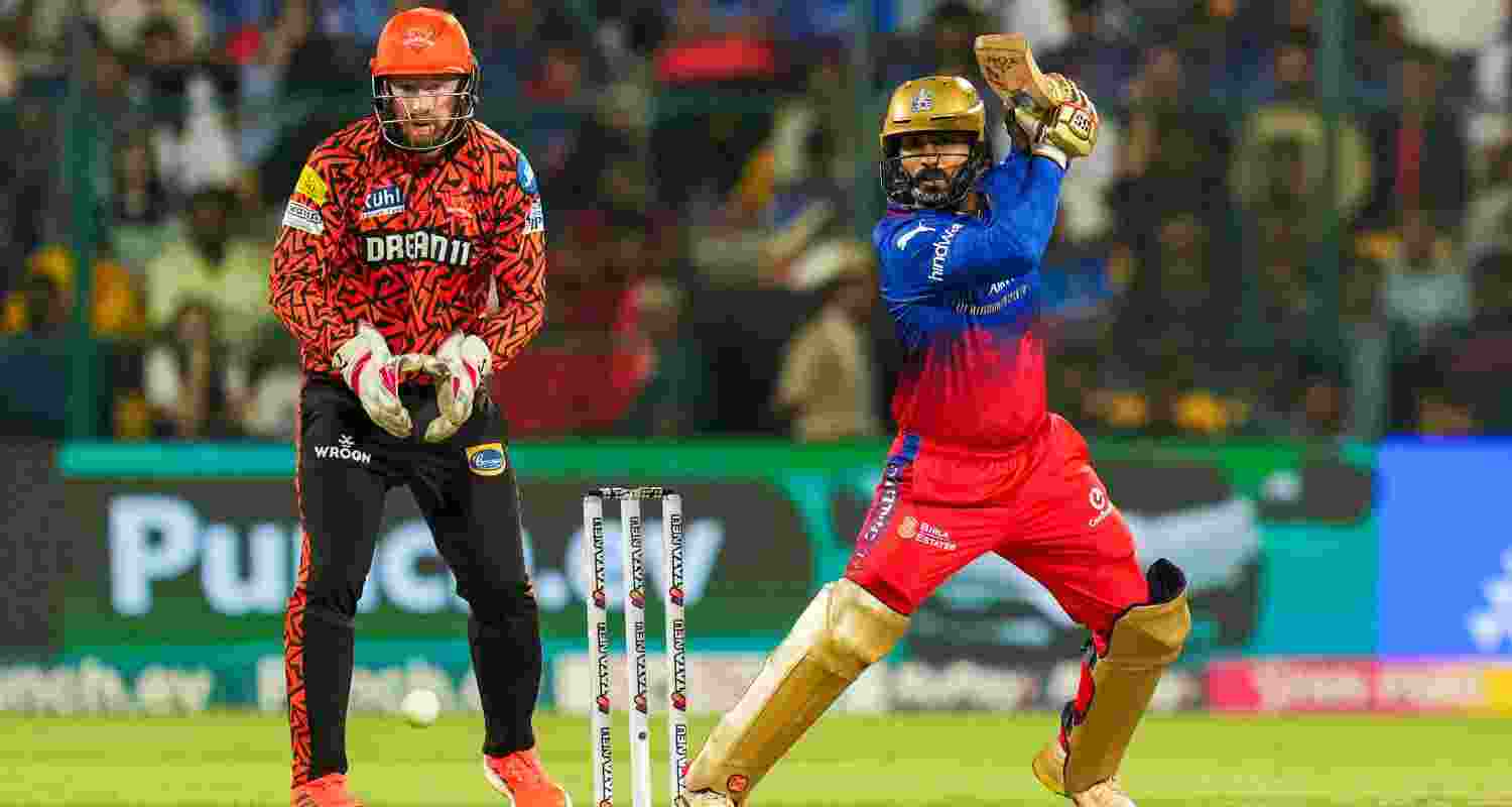 Dinesh Karthik plays a shot during the match against Hyderabad.
