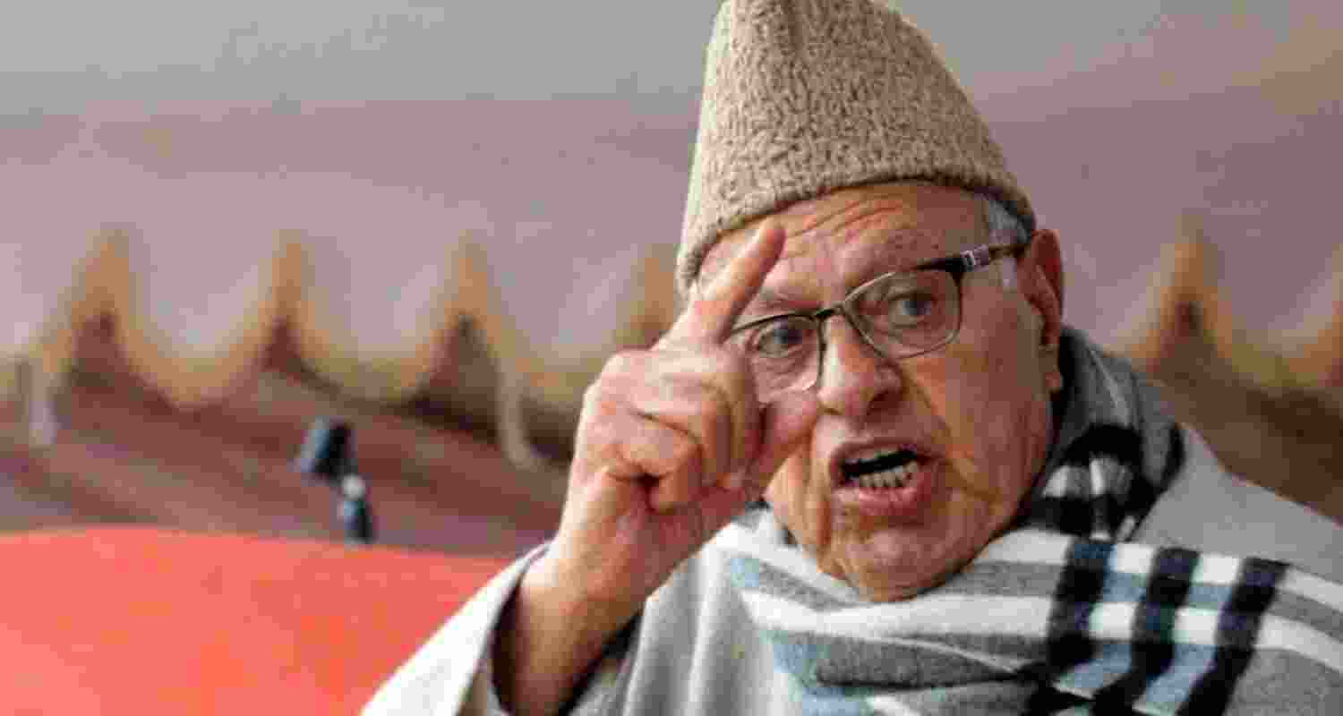 AN image of NC leader Farooq Abdullah addressing a crowd.