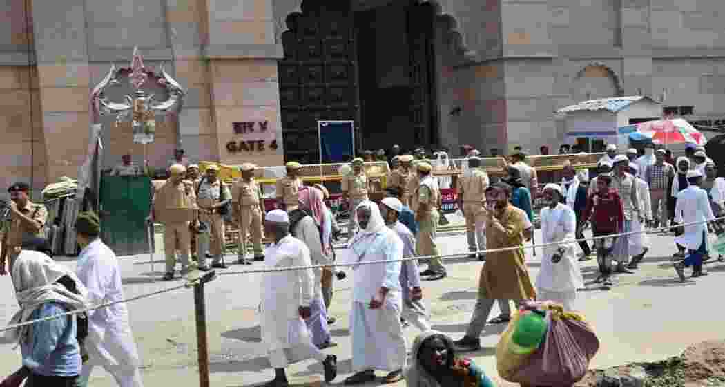 Muslims come out of Gyanvapi mosque after offering prayers amid tight security in Varanasi.