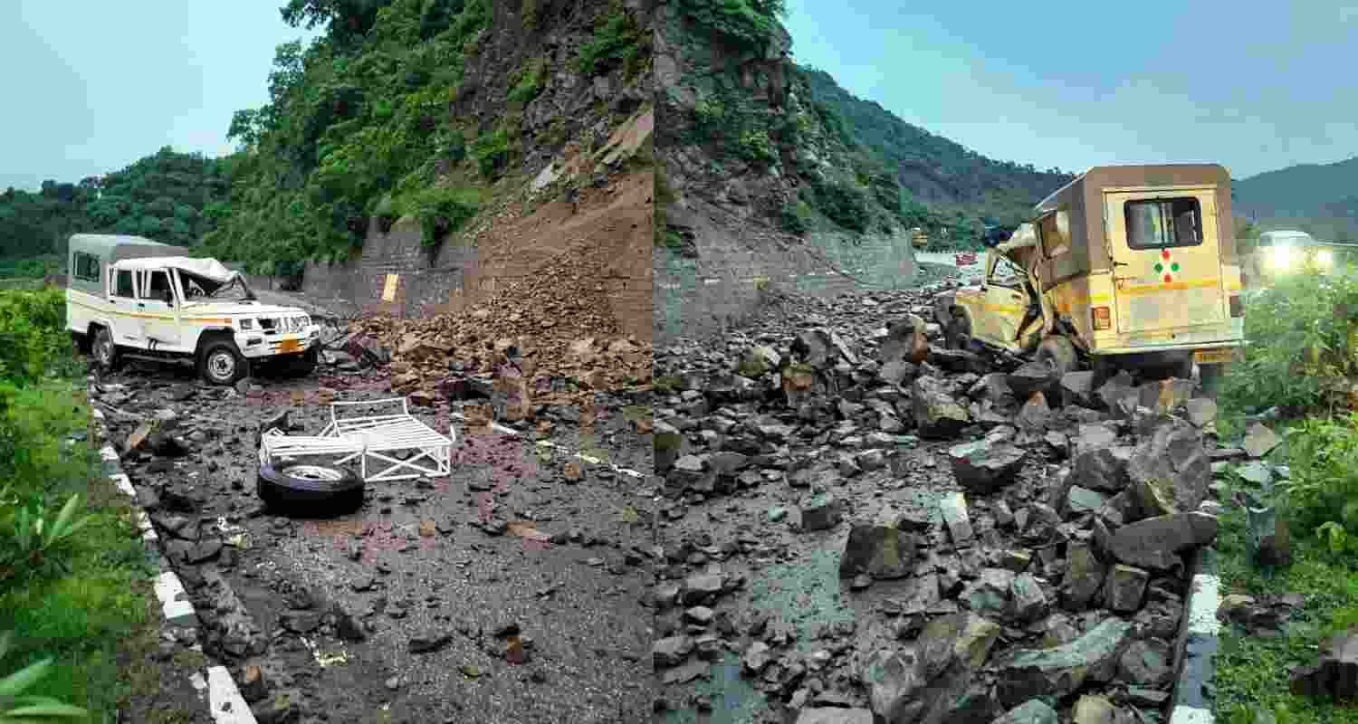 A vehicle damaged by boulders after landslide near Parwanoo, in Solan district, Monday, July 29, 2024. 