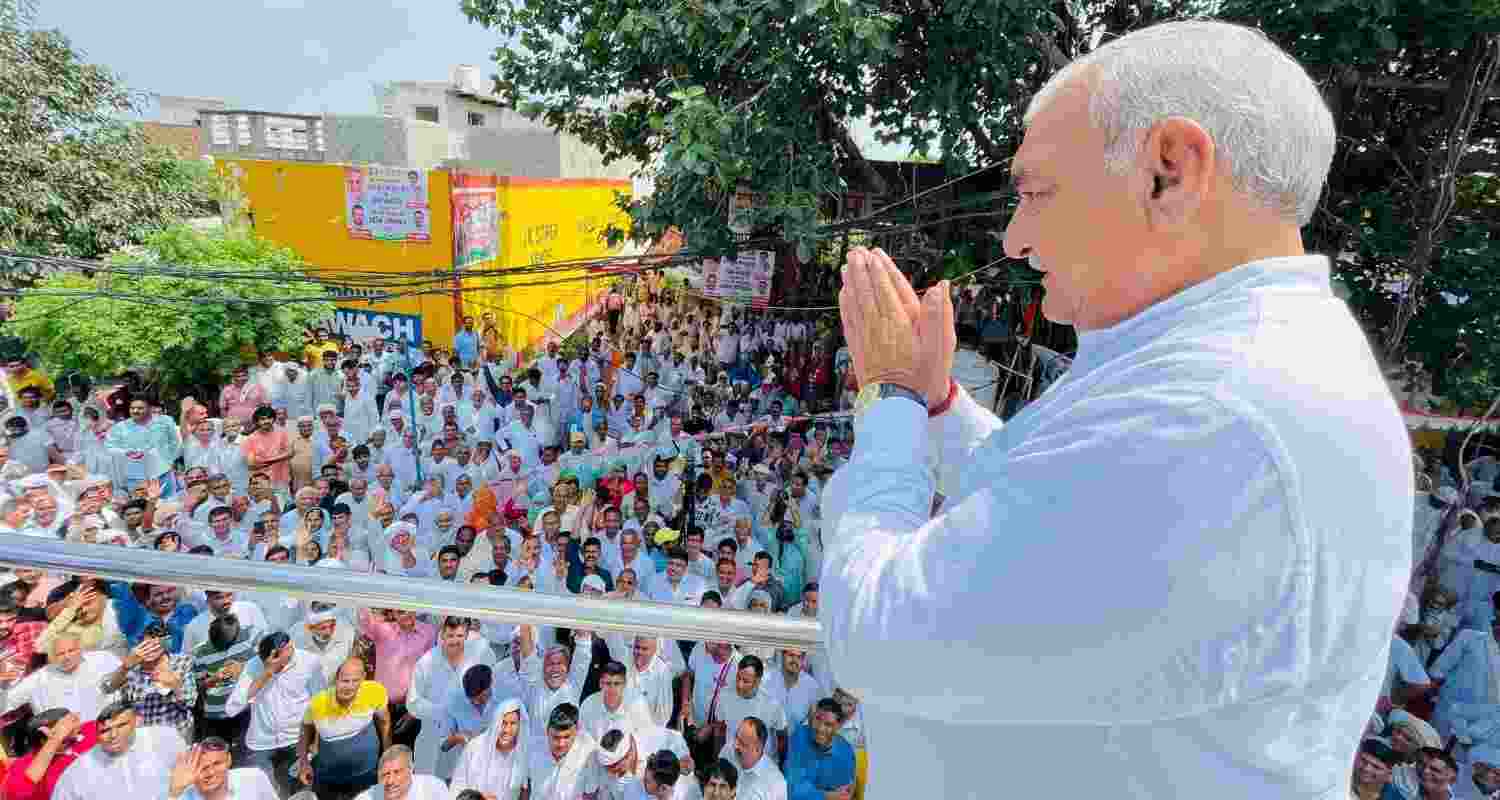 Bhupinder Singh Hooda addressing a rally in Haryana.