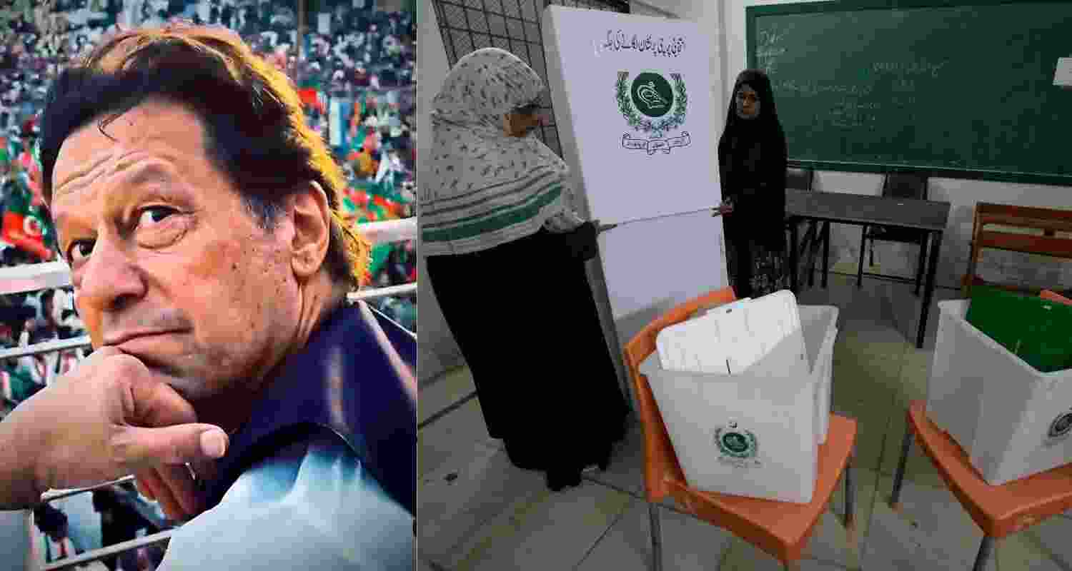 Poll booth workers at a booth in Islamabad, with a picture of former PM Imran Khan