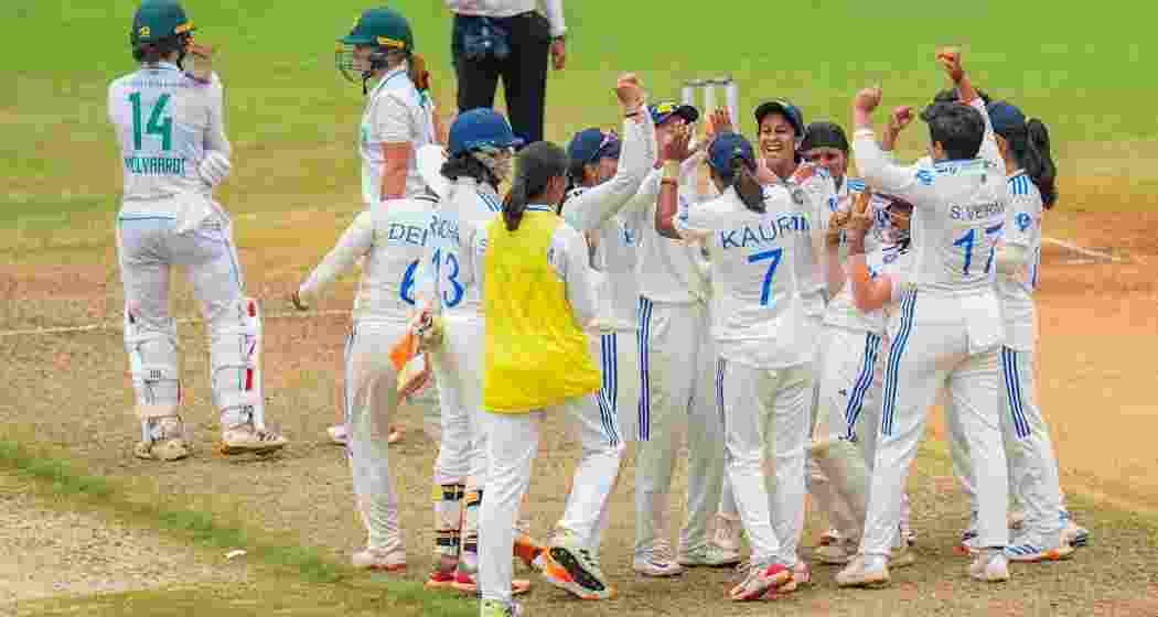 India's Rajeshwari Gayakwad celebrates with teammates after taking the wicket of South Africa Women's captain Laura Wolvaardt on the 4th and last day of the one-off test cricket match between India and South Africa at MA Chidambaram Stadium, in Chennai, Monday, July 1, 2024.