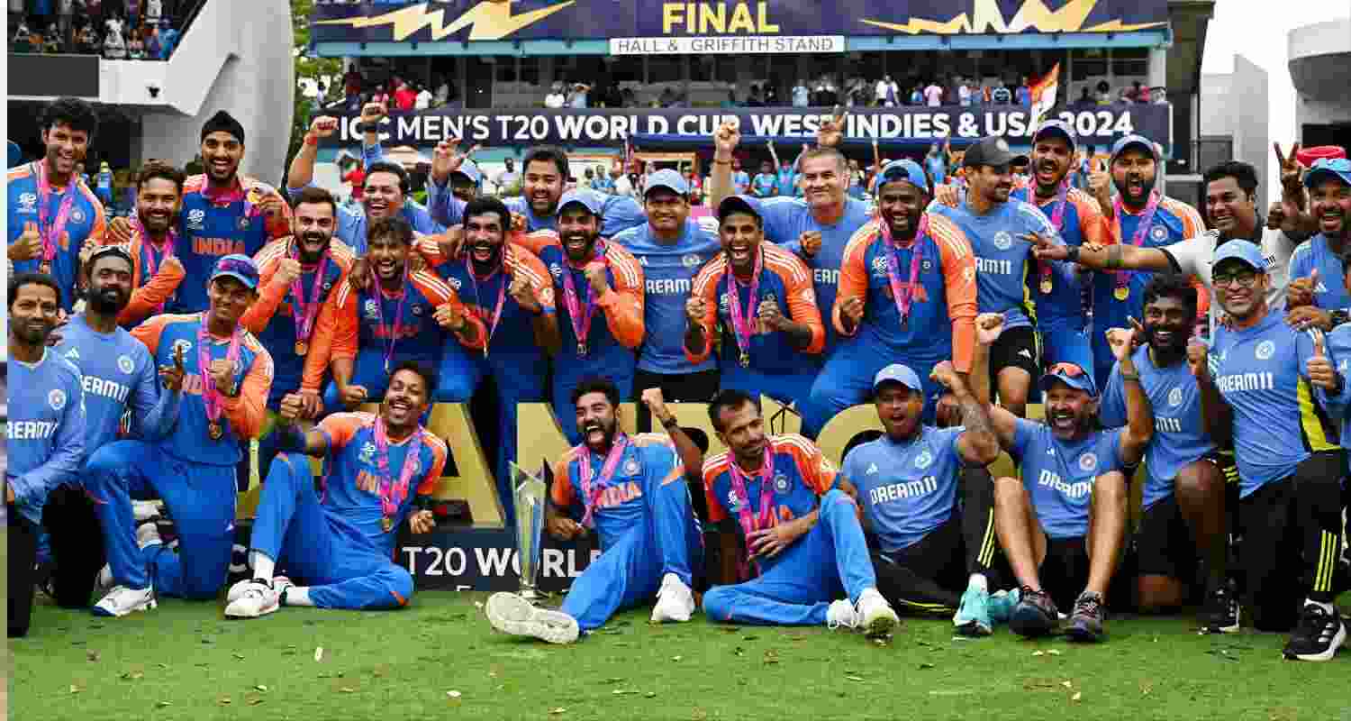 Team India celebrate with the T20 World Cup Trophy.