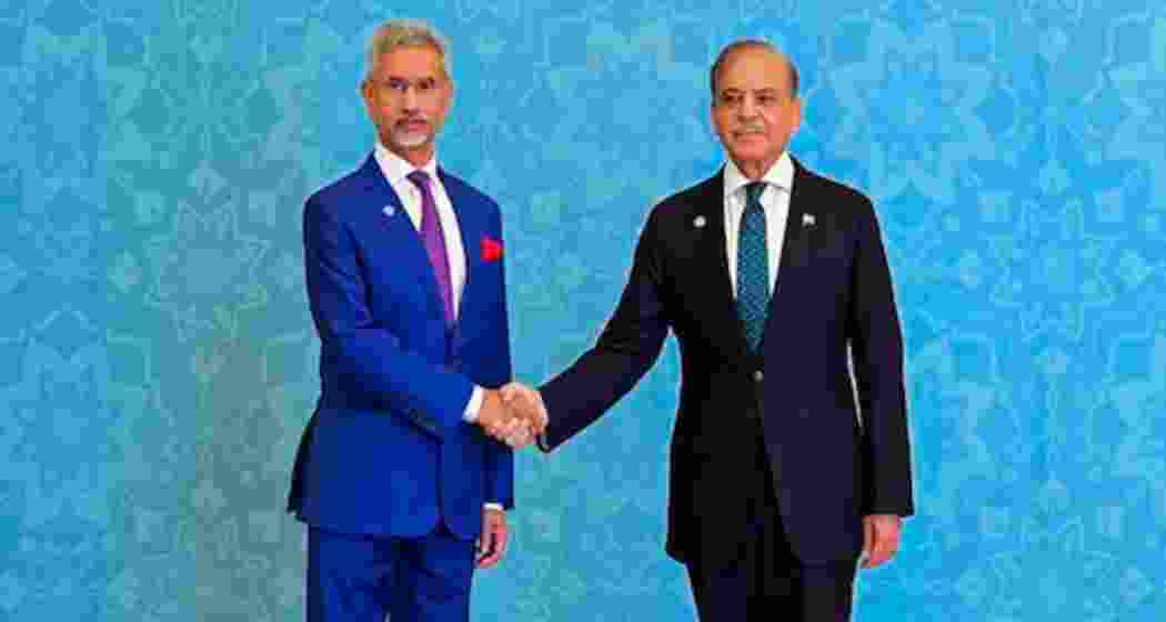 External Affairs Minister S Jaishankar shakes hands with Pakistan Prime Minister Shehbaz Sharif at the 23rd meeting of the SCO Council of Heads of Government, in Islamabad.