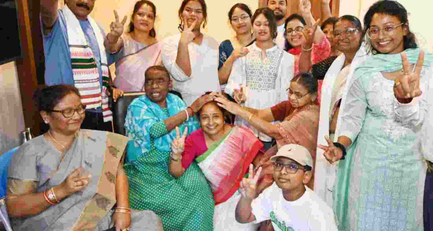 JMM leader Kalpana Soren being greeted by her family members as she leads during counting of votes for Gandey Assembly Constituency bypoll, in Giridih district, Tuesday,