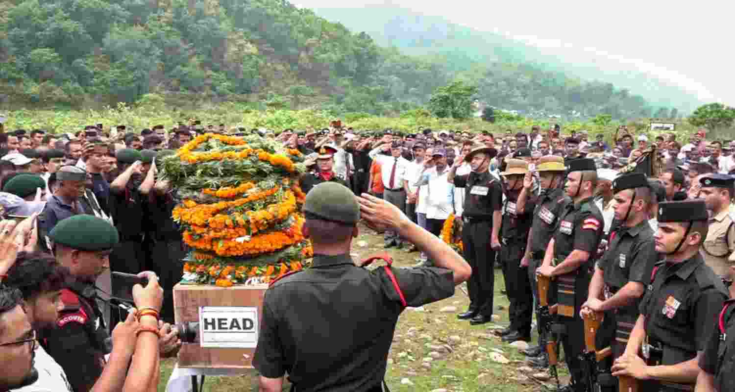 Pauri Garhwal: Army personnel and others pay tribute to the mortal remains of Havaldar Kamal Singh who was martyred in the recent terror attack in Jammu and Kashmir�s Kathua district, at his home, in Pauri Garhwal district.