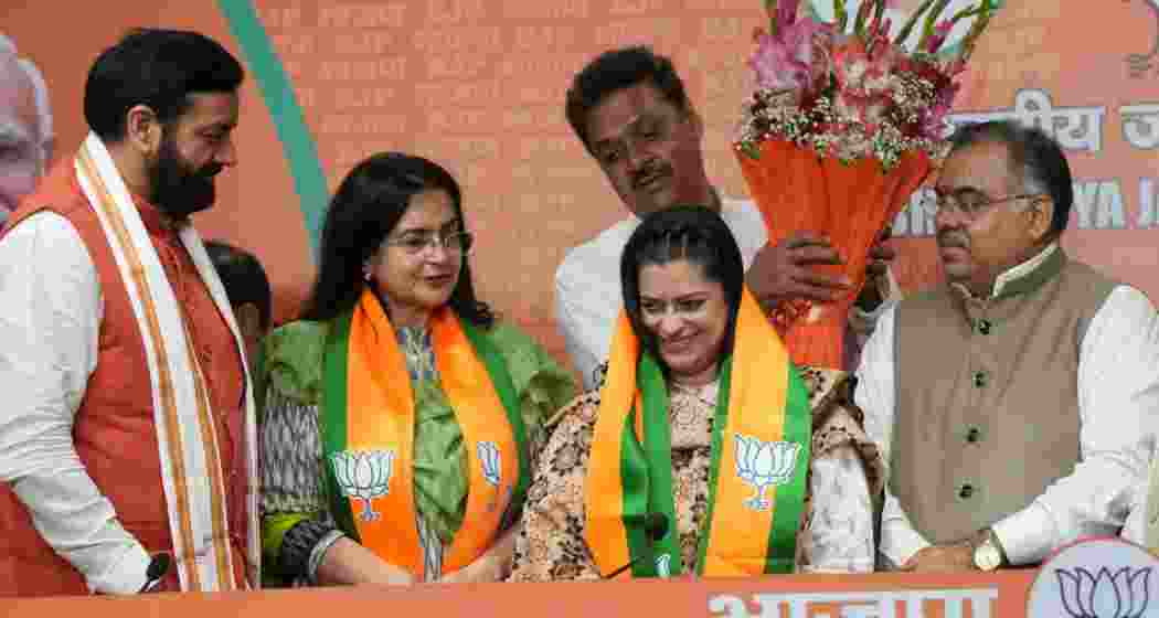 New Delhi: Haryana Chief Minister Nayab Singh Saini felicitates former Haryana Congress leaders Kiran Choudhry (second from left) and her daughter Shruti Choudhry after joining BJP, in New Delhi, Wednesday.