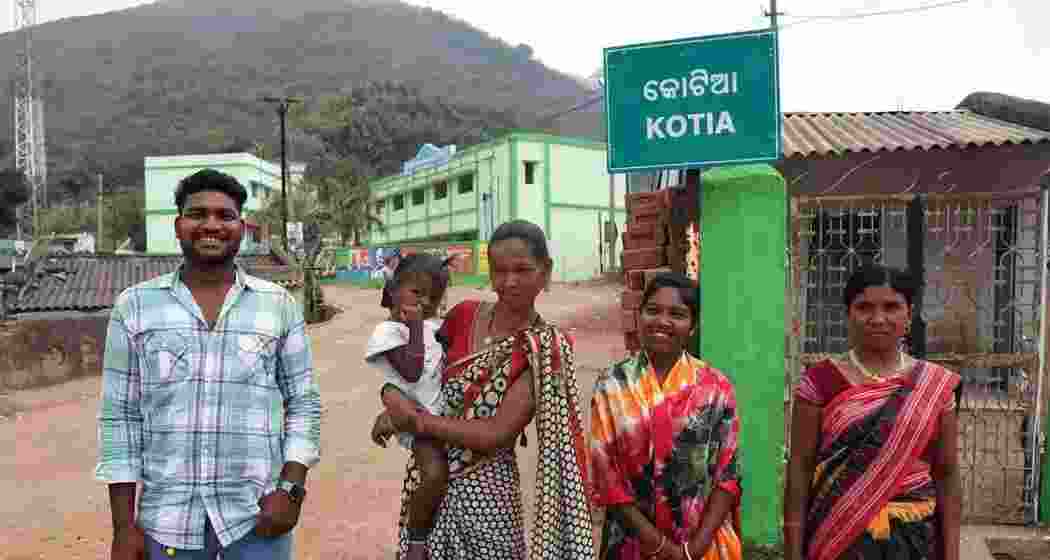 People pose for a picture at the Kotia gram panchayat, Koraput district in south Odisha. 