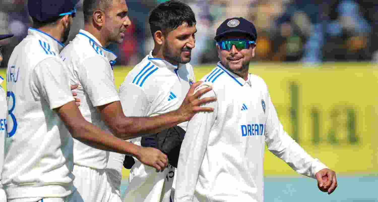 India's Ravichandran Ashwin, Kuldeep Yadav, Mohammed Siraj and Dhruv Jurel during the first day of the fifth Test cricket match between India and England, in Dharamshala on Thursday.