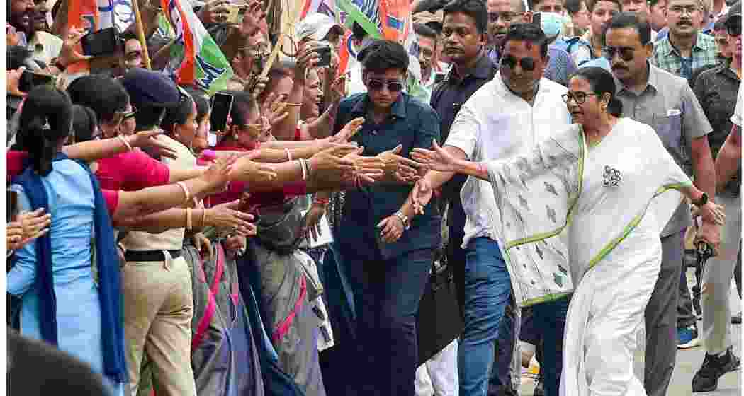  West Bengal Chief Minister and Trinamool Congress chief Mamata Banerjee during a road show for Lok Sabha elections, in Kolkata on Tuesday.