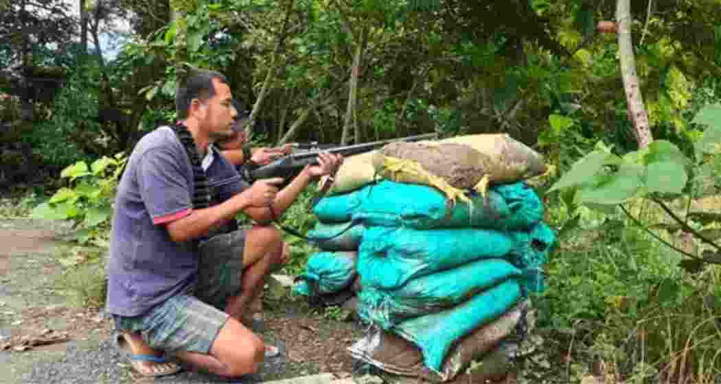 Locals on alert amid ongoing ethnic violence in Manipur, at Phayeng in Imphal West district, Tuesday, July 25, 2023.