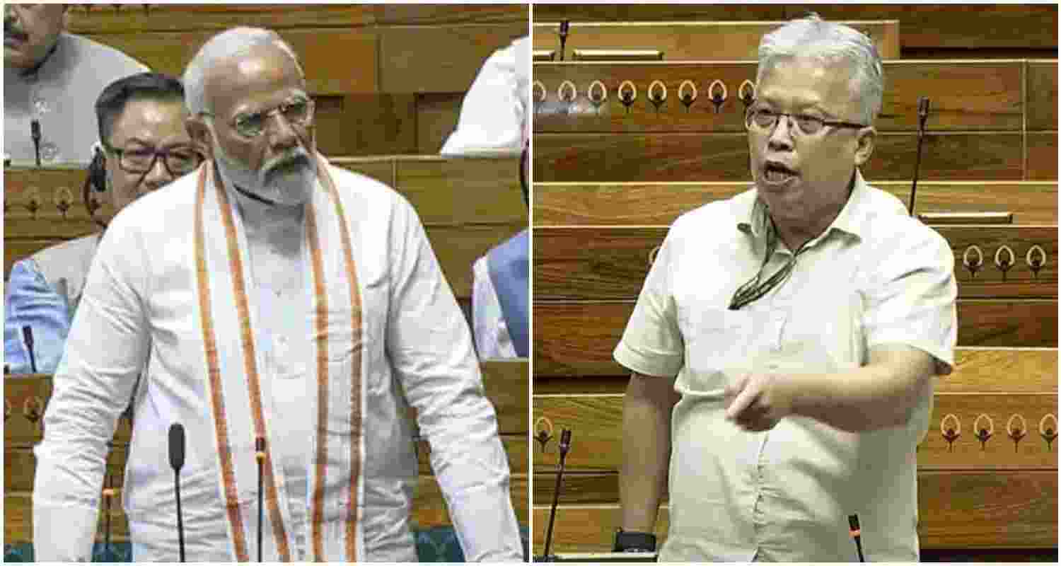 Prime Minister Narendra Modi (L), newly elected MP from Inner Manipur Parliamentary constituency, Dr. Angomcha Bimol Akoijam (R). 